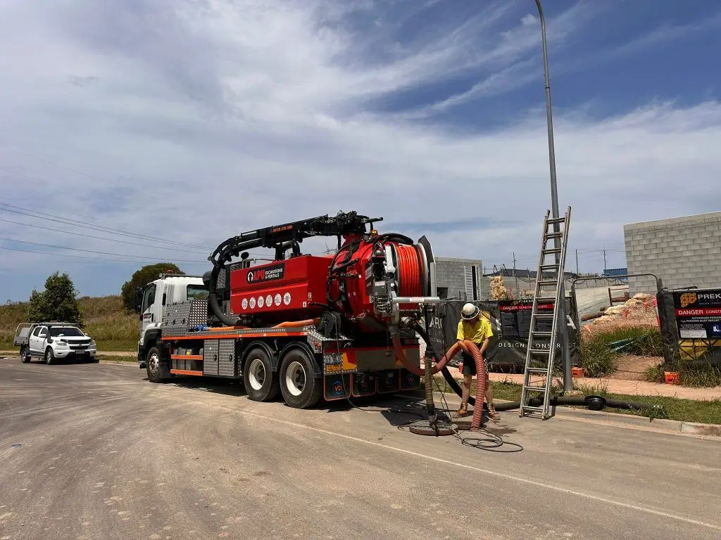 Vacuum excavation truck jetting storm water pipes in Brisbane